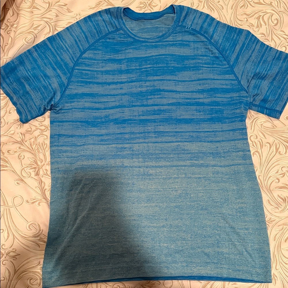 Lululemon blue t shirt.